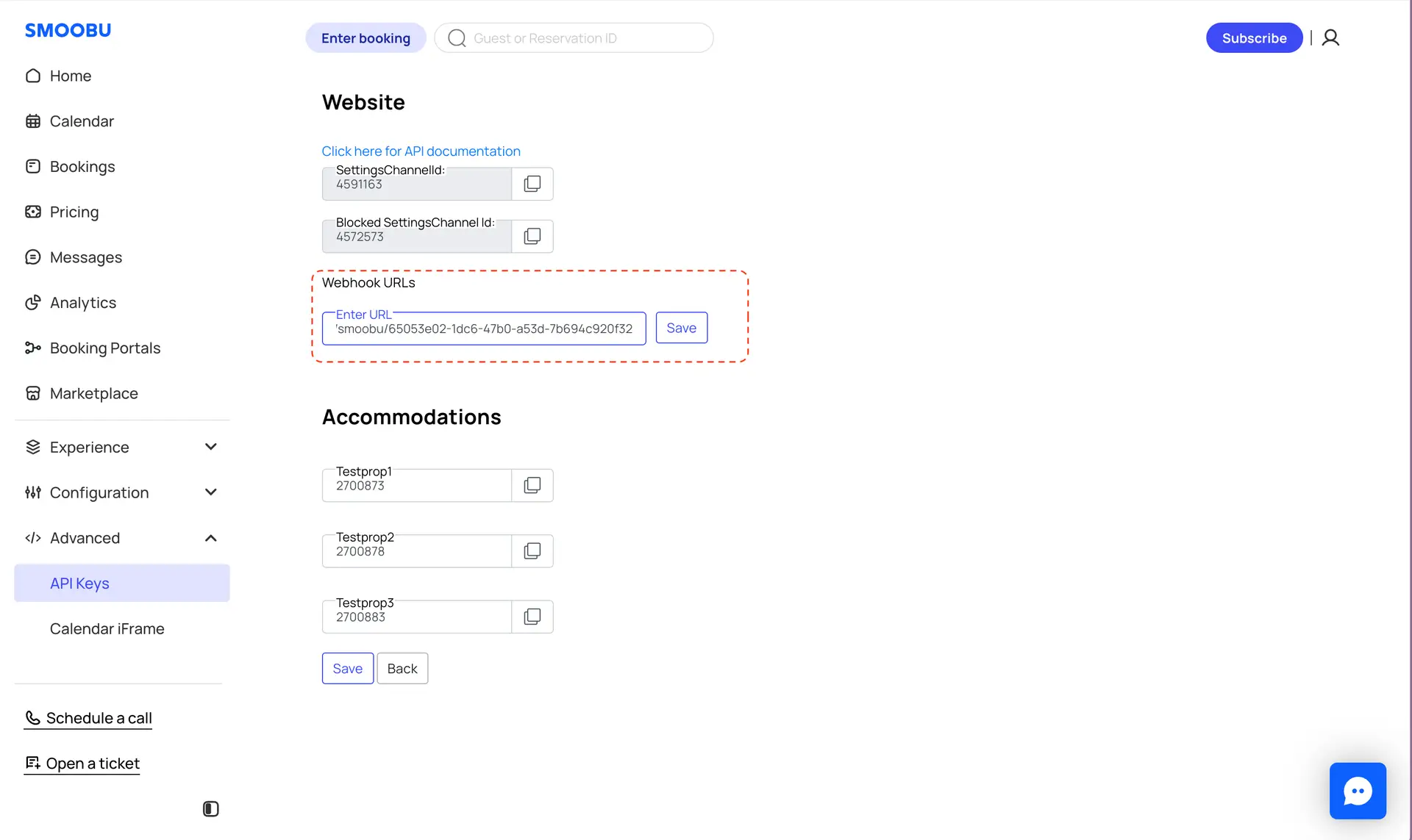 Smoobu API Keys management interface showing Website and Accommodations sections with fields for SettingsChannelId, Blocked SettingsChannel Id, Webhook URLs, and property IDs.
